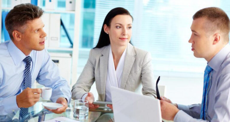 manager and employees collaborating in a meeting